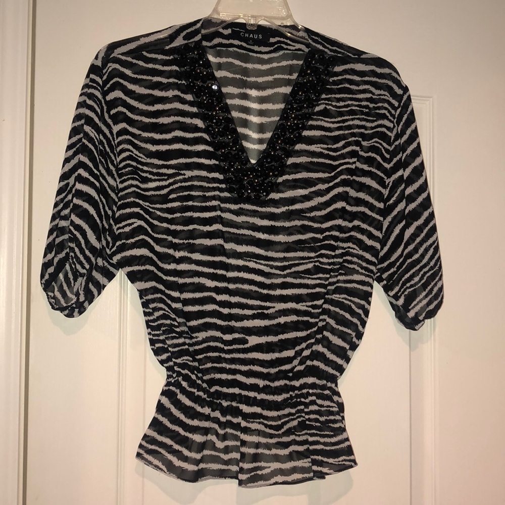Zebra v neck blouse with neckline embellishment